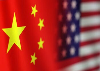 FILE PHOTO: U.S. and Chinese flags are seen in this illustration taken, January 30, 2023. REUTERS/Dado Ruvic/Illustration