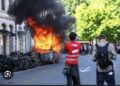 Protesters Set Tesla Ablaze, Smash UN Office’s Windows In Geneva Anti-G7 March